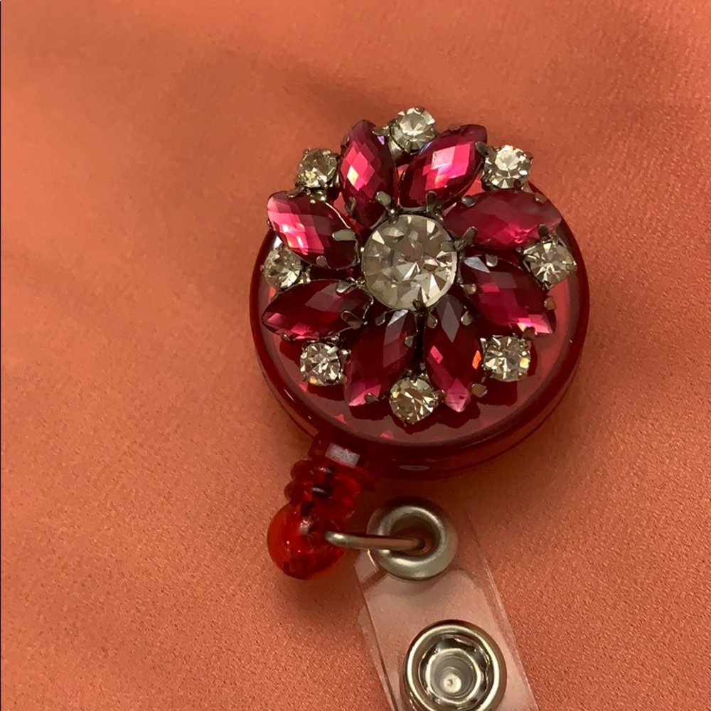 Pink and clear rhinestone badge reel